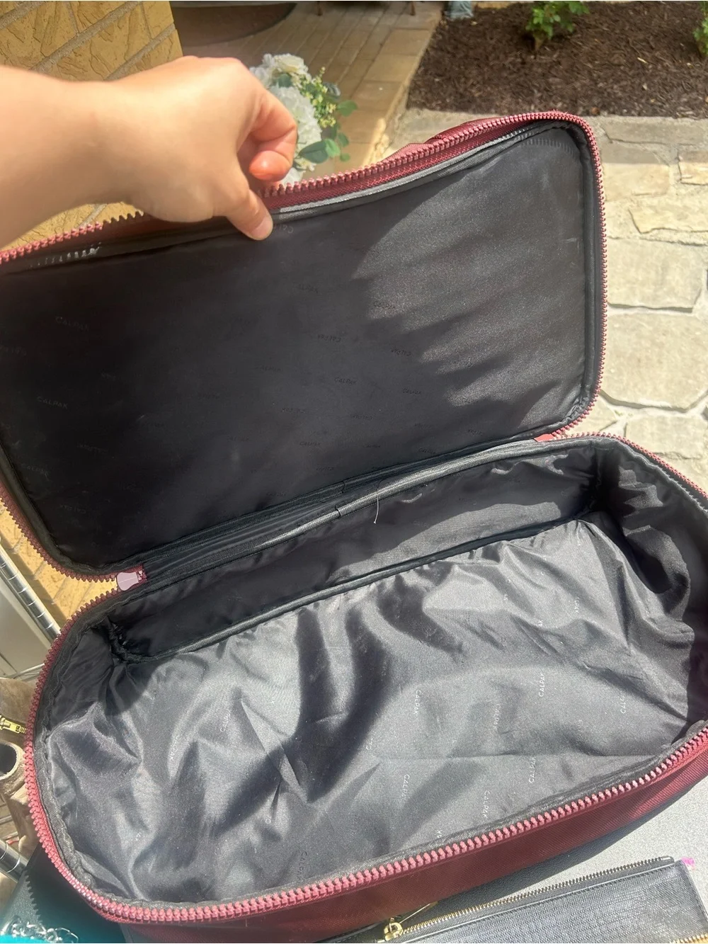 Calpak Men's Maroon Travel Duffel Bag